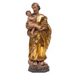 An Italian carved, painted and parcel giltwood group of Saint Joseph and the Infant Christ,
