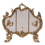 A gilt metal and mesh firescreen in Louis XV style, late 19th /early 20th century,