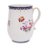 A large Chelsea-Derby mug: of gentle bell shape with scroll handle,