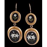 A pair of pietra dura ear pendants,: the oval hardstone panels with hardstone white flower inlay,