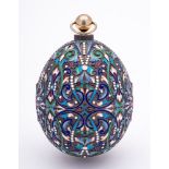 A late 20th century silver gilt and champlevé enamel Easter egg in the Imperial Russian style: