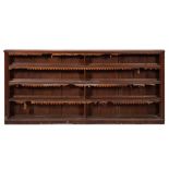 A Victorian mahogany low open bookcase:, having a moulded edge and rounded corners,