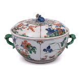 A Chinese famille verte two-handled circular bowl and cover: with lion dog finial and mythical