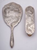 A Chinese silver backed hand mirror, Stamped marks, maker T.