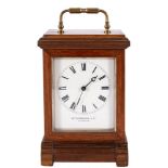 A French Victorian walnut cased carriage clock retailed by Thornhill,