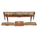 A Louis XVI carved oak and tapestry upholstered window seat, basically circa 1780,