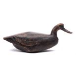 A carved hard wood goose decoy: 54cm long.