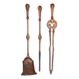 A set of Art Nouveau influence brass fire tools: includes poker, tongs and shovel. (3).