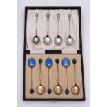A set of six George V silver and enamelled coffee spoons, maker Henry Clifford David, Birmingham,