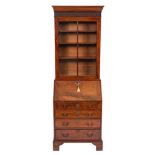 A George III mahogany bureau:, and associated 19th Century bookcase of small size,