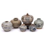 A group of four small Chinese Swatow and South East Asian jars,