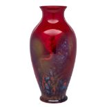 A Royal Doulton 'Sung' flambe baluster vase and a Royal Doulton flambe bowl: the vase with an