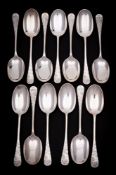 A set of thirteen Victorian silver Hanoverian pattern dessert spoons,