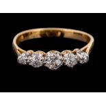 An 18 carat gold and diamond ring,: set with five old brilliant cut diamonds, approximately 0.