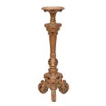 A 19th Century Italianate carved giltwood torchere:,