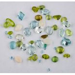 A group of loose gemstones,