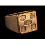 A 9 carat gold signet ring,: the square panel stamped 375 with full Sheffield hallmarks for 1980,