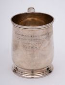 A George V silver mug, maker Fowler & Polglaze, London, 1924: inscribed, of cylindrical outline,