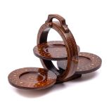 A mahogany and inlaid metamorphic three-tier cake stand: of circular form with three folding discs