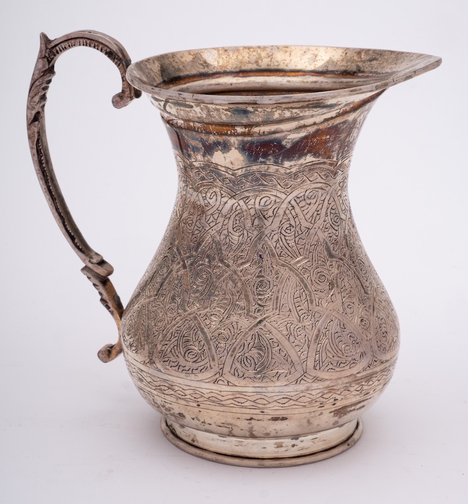 An Egyptian silver water jug,