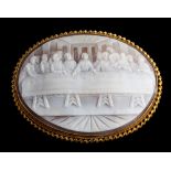 A 9 carat gold oval shell cameo brooch depicting The Last Supper: within a rope twist frame,
