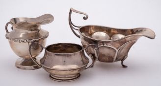 A George V silver gravy boat, maker Walker & Hall, Sheffield, 1917: of traditional design,