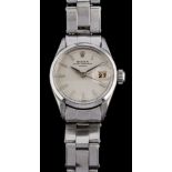 Rolex, Oyster Perpetual, a stainless steel wristwatch,: the silvered dial with baton markers,