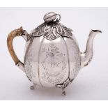 A Georgian silver teapot, all marks rubbed and worn, maker possibly William Reynolds ? Cork,