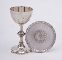 A matched silver travelling two piece communion set: the paten, maker George Edwards & Edward Brown,