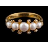 A cultured pearl and diamond ring,