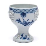 A rare First Period Worcester blue and white egg cup: applied with flower sprigs,