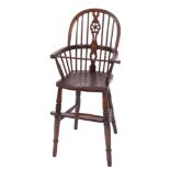 A child's early 19th Century elm, ash and beech Windsor wheel and stick back high chair:,