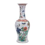 A Chinese famille verte yen-yen vase: the ribbed waisted slender neck with flared rim,