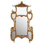 A contemporary gilt framed mirror in the Chinese Chippendale manner: the central arched panel and