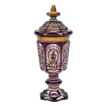 A Bohemian purple and clear overlay glass goblet and cover: of hexagonal form with pointed finial