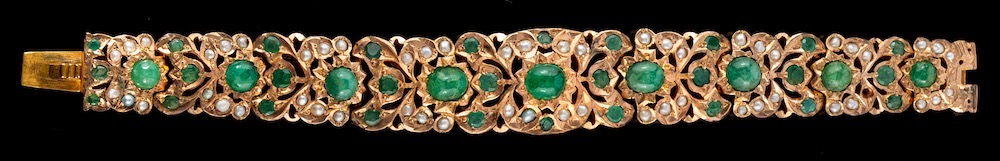An emerald and pearl bracelet,: the tapered bracelet set with cabochon and...