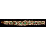 An emerald and pearl bracelet,: the tapered bracelet set with cabochon and circular cut emeralds,