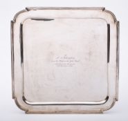 A George V silver presentation tray, maker Martin Hall & Co Ltd, Sheffield, 1929: inscribed,