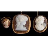 A shell cameo ring,: the oval shell cameo carved with a woman's profile, stamped 750,