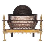 A Georgian brass and cast metal fire basket: arched back with low relief neo-classical urn and