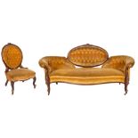A Victorian Pteridomania carved walnut and upholstered sofa, probably Irish, circa 1870,