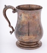 A George VI silver pint mug, make BH, Sheffield, 1945: of baluster form,
