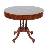 A Victorian yew wood and leather inset library drum table, mid 19th century,