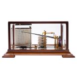Newton & Co, a mahogany barograph: the case with glazed top and sides all standing on stepped feet,