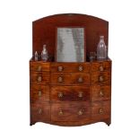 A George IV gentleman's mahogany and inlaid bow-fronted dressing chest:,