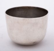 An 18th century silver tumbler cup, marks worn, maker IW, : initialled,of plain circular outline, 4.
