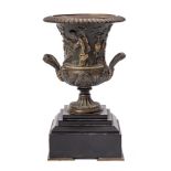 A bronze model of a Campana urn: decorated with low relief bacchanalian putti,