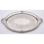 An Edward VII silver serving tray, maker Pearce & Sons, Sheffield, 1908: of oval outline,