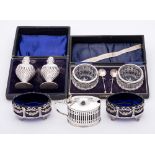 A mixed lot of silver wares, various makers and dates: includes a pair of pepperettes,