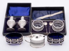 A mixed lot of silver wares, various makers and dates: includes a pair of pepperettes,